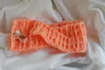 Fascia copri-orecchie in lana per bimba salmone