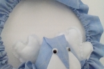Fiocco nascita bimbo in tessuto di cotone in una delicata tonalità di azzurro