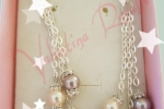 Orecchini pendenti con perle sintetiche