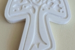 Simbolo del Tau di San Francesco in polvere di ceramica
